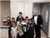 Mayor Posing With Children at Police Department