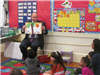 Mayor Venezia Shows Pictures of Storybook to Carteret School Children in July 2014