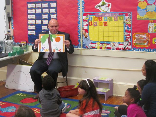 Mayor Venezia Shows Pictures of Storybook to Carteret School Children in July 2014